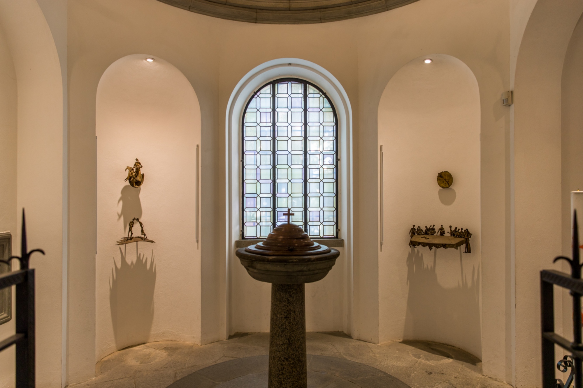 Cecco Bonanotte's baptismal font and sculpture cycle
