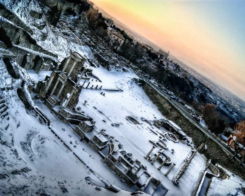 Volterra roman theatre covered in snow